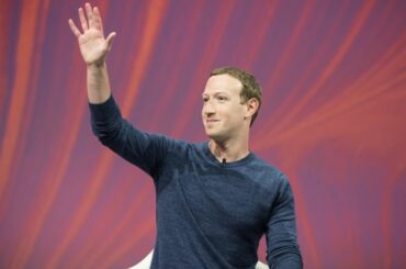 Mark Zuckerberg waving